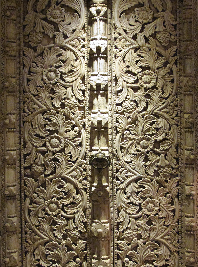 Detail from a carved Gujarati Door